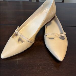 Can you Haandle this?   Cole Haan beige flats, size 5 1/2.